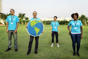 Group of happy and diverse volunteers